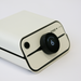 Zapp Plus White electronic device with a black knob and 'zapp' branding on a light gray background