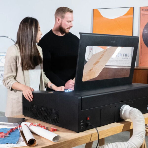 FLUX BeamBox Pro 50W CO2 Laser Cutter & Engraver people using the beambox