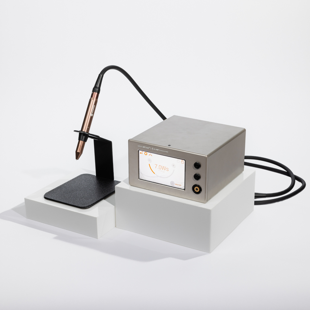 Orion mPulse Welder  Electronic device with a digital display and pen-like component on a white background