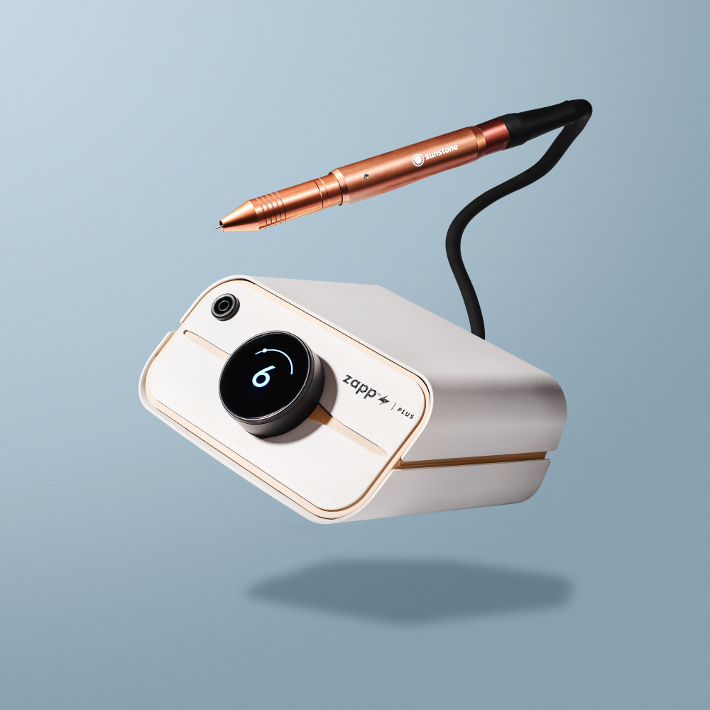 Zapp Plus 2  White electronic device with a pen-like attachment on a light blue background