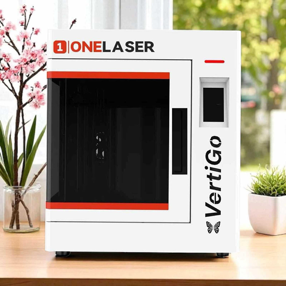 OneLaser VertiGo machine set up on a workbench for drinkware engraving