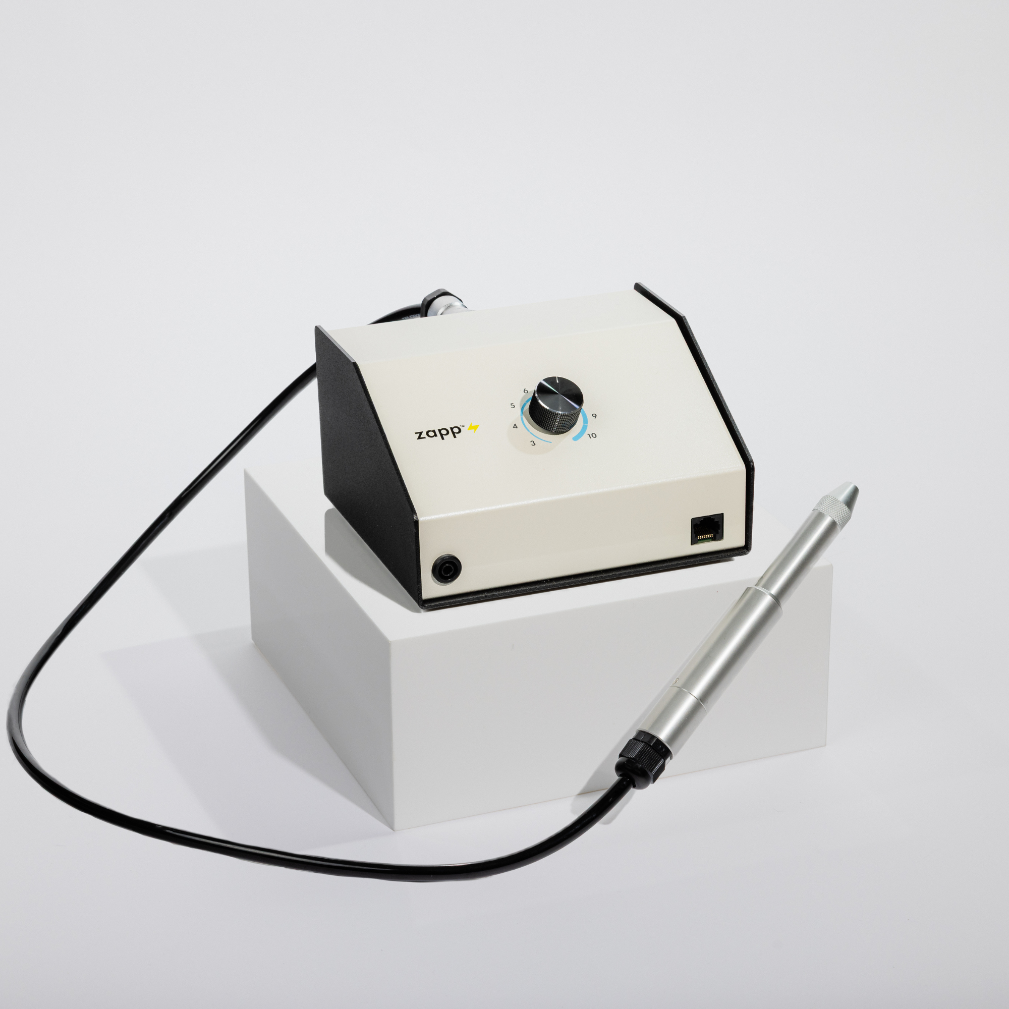 Zapp Welder White electronic device with a pen-like attachment on a white background, branded 'zapp'.